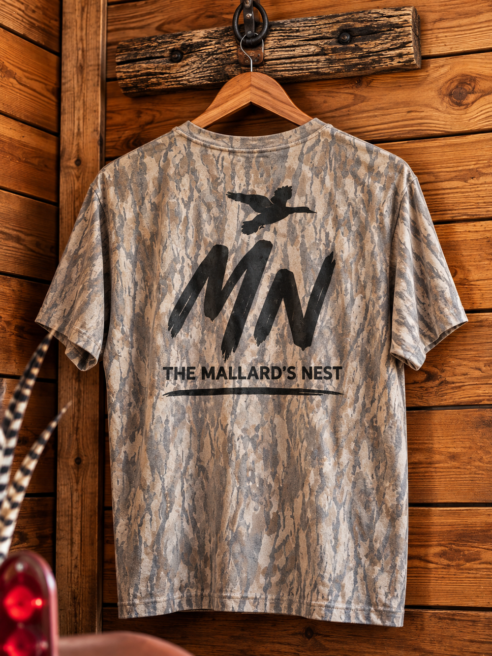 The Mallard’s Nest Mossy Oak Faded Camo Tee Logo Black