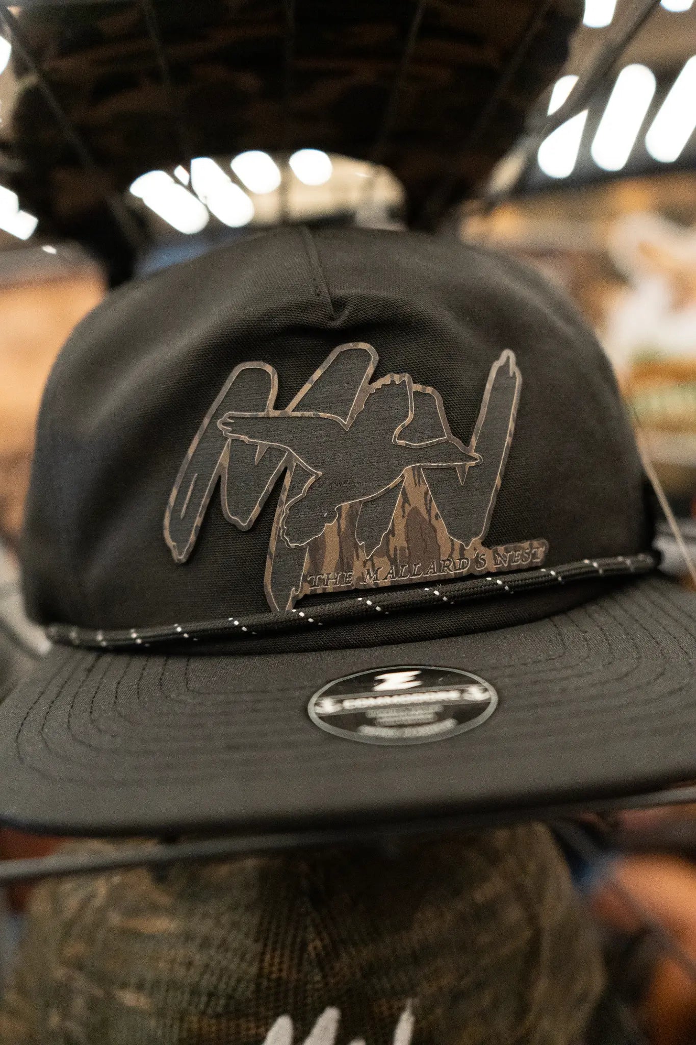 Close view of a Mallard’s Nest branded black hunting hat